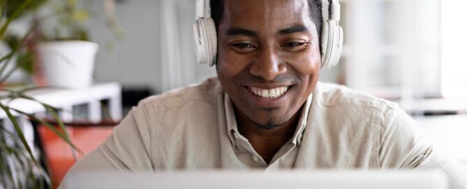 Man with headphones and laptop